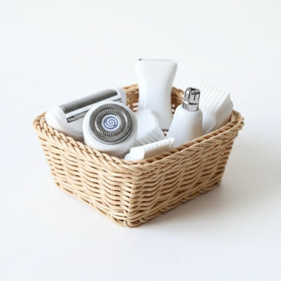 Basket with personal care items on a white background