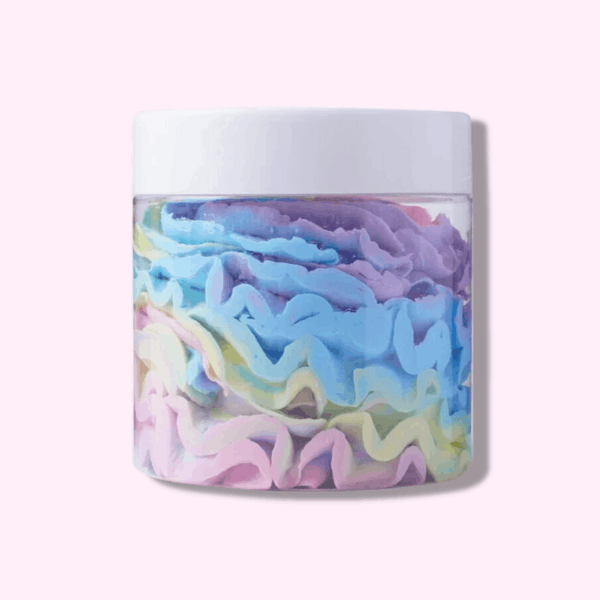Jar of colorful whipped body butter with pastel rainbow